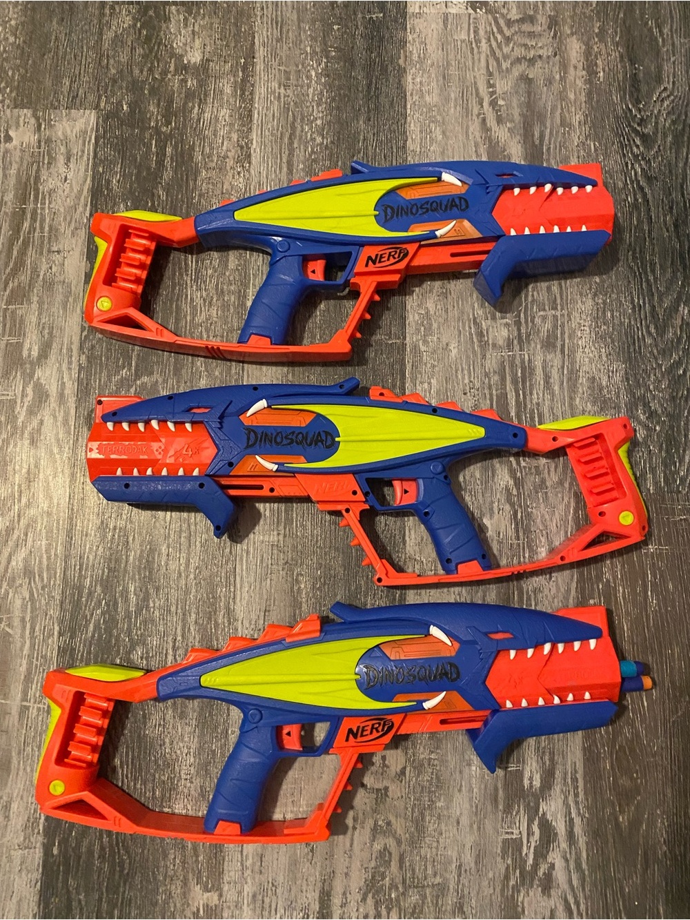 Nerf DinoSquad Triple Pack Blasters - Blue/Orange/Neon Green